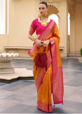 Mesmeric Weaving Banarasi Silk Orange Traditional Saree