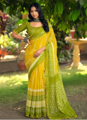Swanky Printed Cotton Green and Yellow Trendy Saree